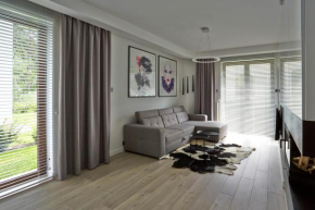 Apartament Baltica z ogródkiem - w ustronnym miejscu tuż przy plaży in Rogowo